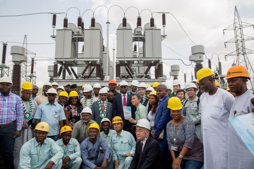 Hon Minister of Power Works  Housing Mr Babatunde Fashola SAN middleSpecial Guest of Honour Japanese Ambassador to Nigeria Mr Sadanobu KusaokerightManaging DirectorCEO Transmission Company of NigeriaTCN MrUsman Gur Mohammed left and others in a group photograph shortly afterthe commissioning of 60MVAR Capacitor Bank funded by Japanese International Cooperation Agency JICA at Apo 13233kV Transmission Substation Apo Abuja on Thursday 12 April 2018